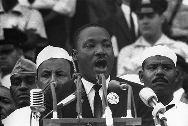 Martin Luther King Jr. giving iconic speech.